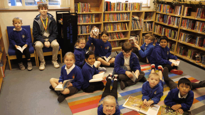 Children in the library at The Beacon Primary School in Exmouth