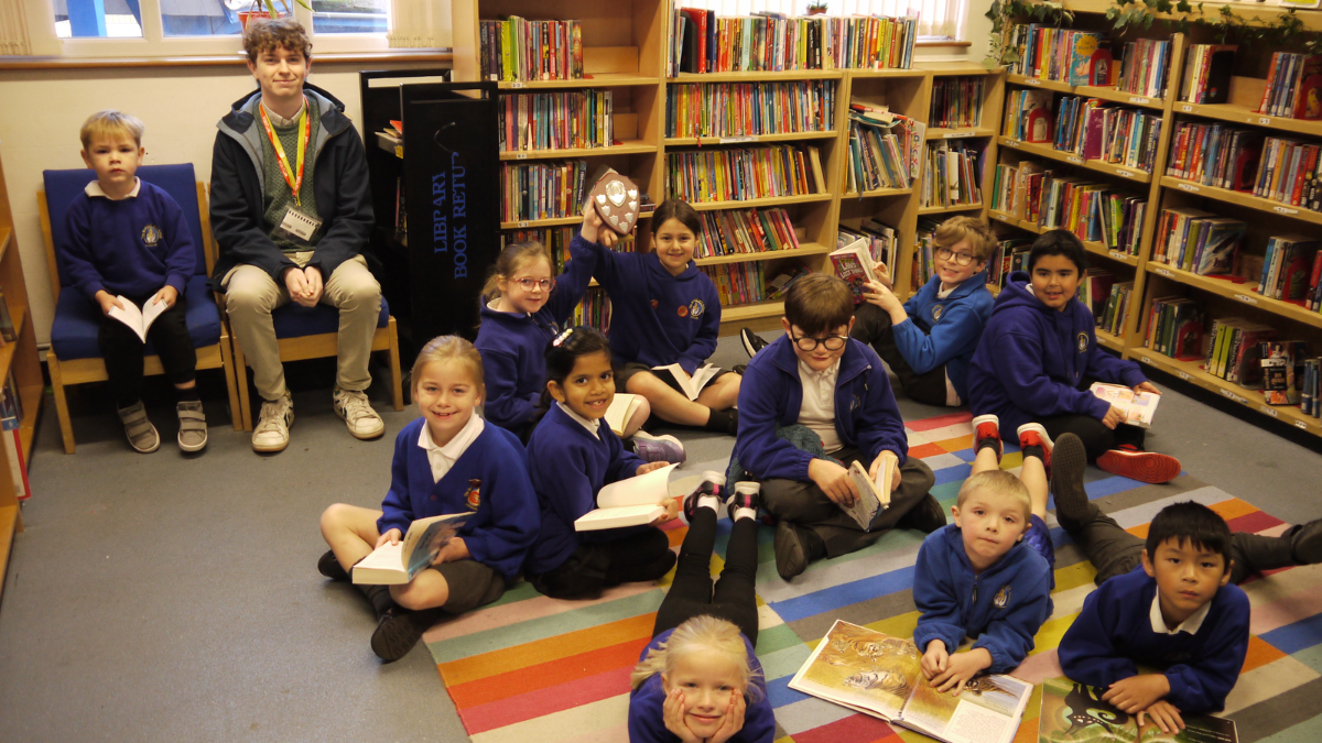 Children in the library at The Beacon Primary School in Exmouth