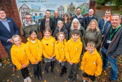 St Nicholas Primary School along with staff from Stagecoach and Devon County Council stood by the mural
