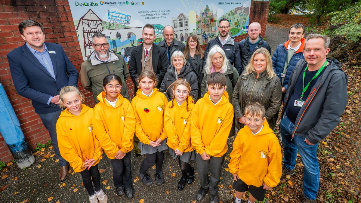 St Nicholas Primary School along with staff from Stagecoach and Devon County Council stood by the mural