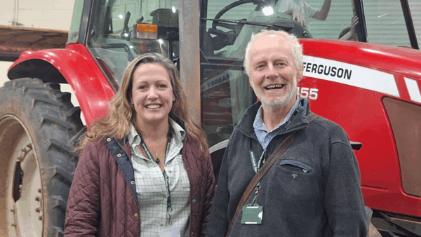 Councillor Cottle-Hunkin and Councillor Gent stood in front of a large tractor