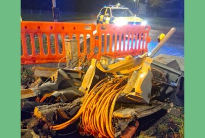Police car near damaged traffic lights