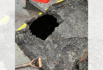 Hole in the road in Kingsbridge