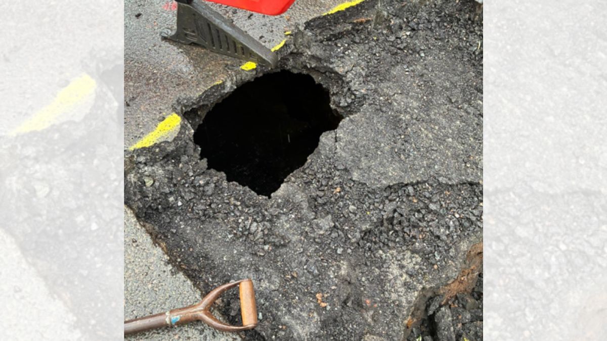 Hole in the road in Kingsbridge