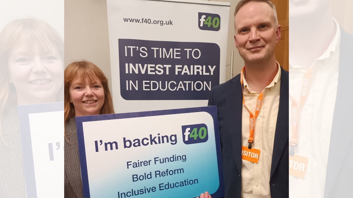 Councillor Denise Bickley and Councillor Richard Jefferies holding a poster that says we're backing the f40 campaign for fairer funding