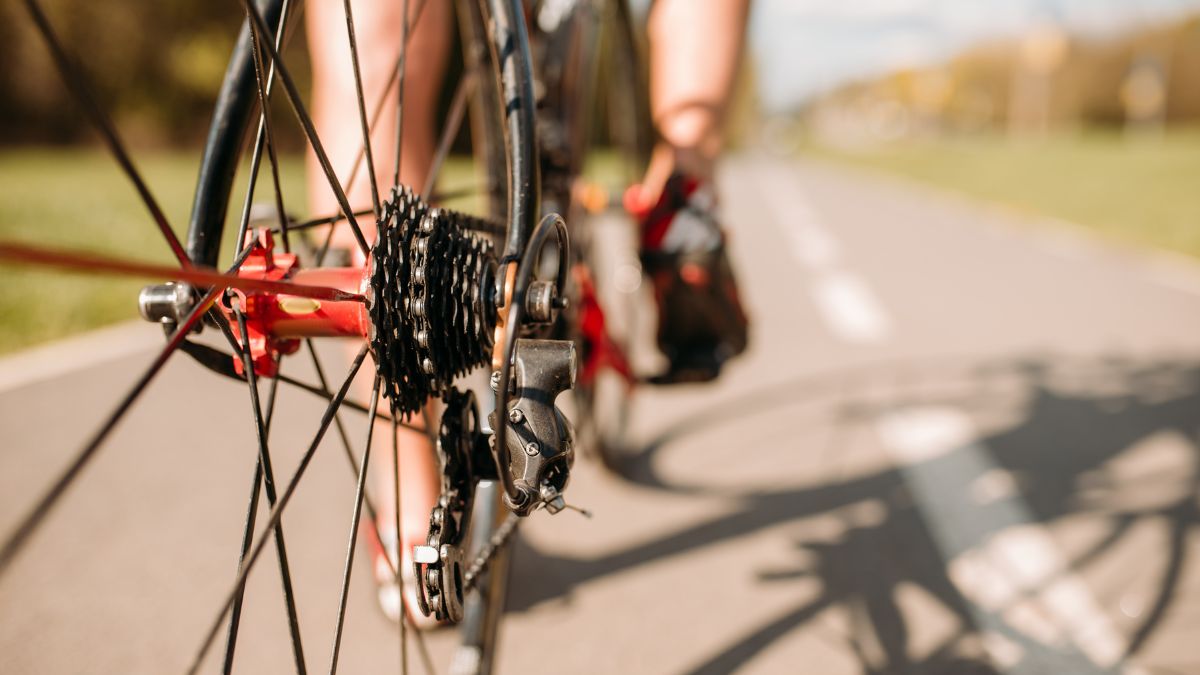 A cyclist on their bike on a cycle path