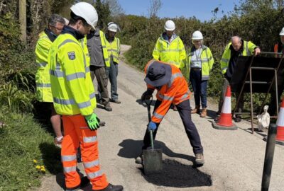 Road warden repairing a pothole