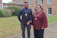 Chair, Councillor Rosie Dawson (right) and Vice Chair Councillor Syed Jusef (left), both stood outside County Hall in Exeter