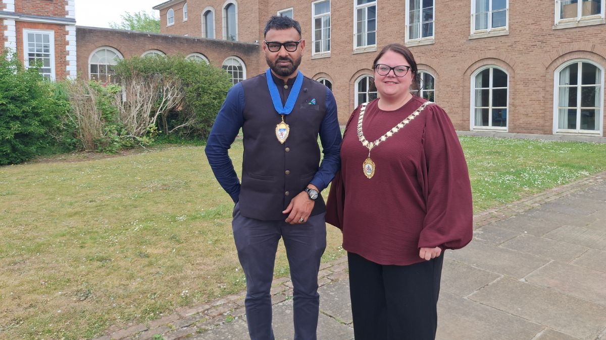 Chair, Councillor Rosie Dawson (right) and Vice Chair Councillor Syed Jusef (left), both stood outside County Hall in Exeter