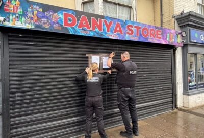 Trading Standards Officers with closure order on Danya Store in Wellington
