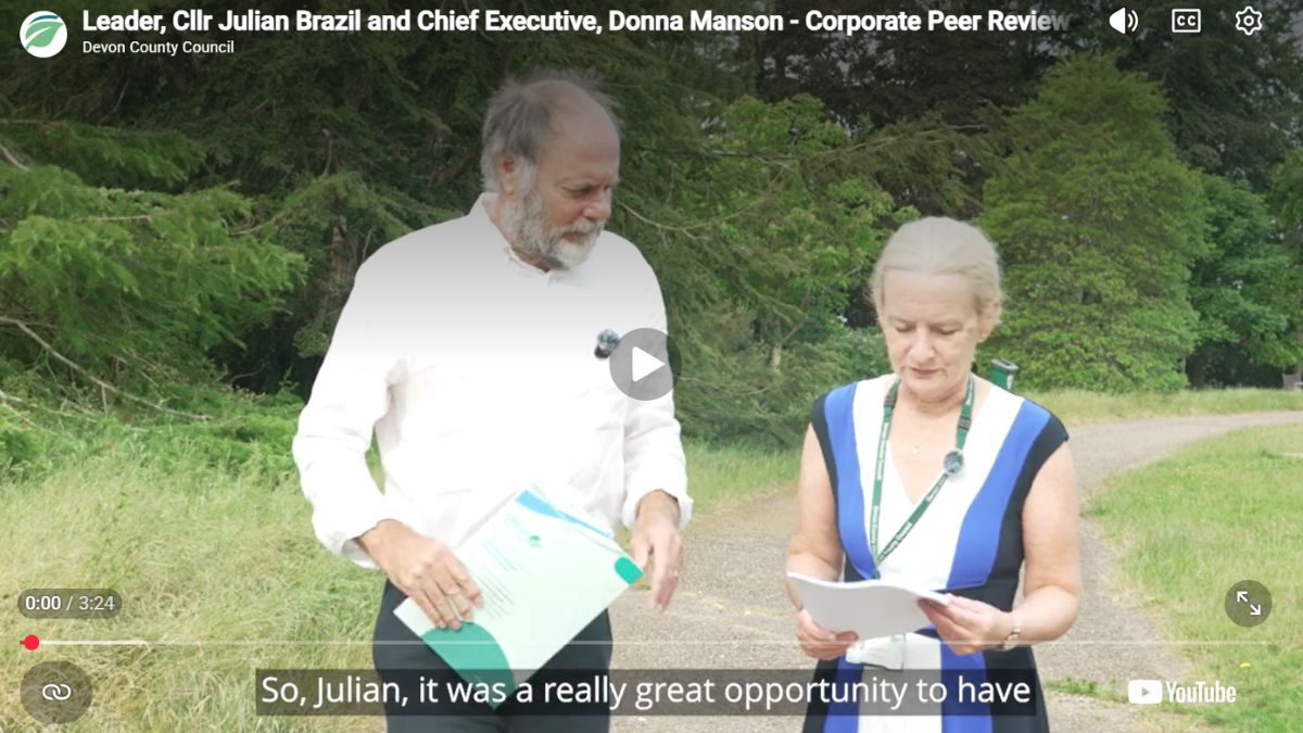 Councillor Julian Brazil, Leader of the council, and Donna Manson, Chief Executive of the Council, talking outside County Hall together about the very positive corporate peer review report