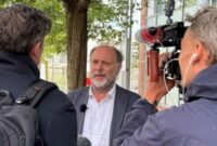 Councillor Julian Brazil being interviewed