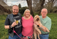 Shared Lives Carers Susan and Robert Smith with Spike, who they support.