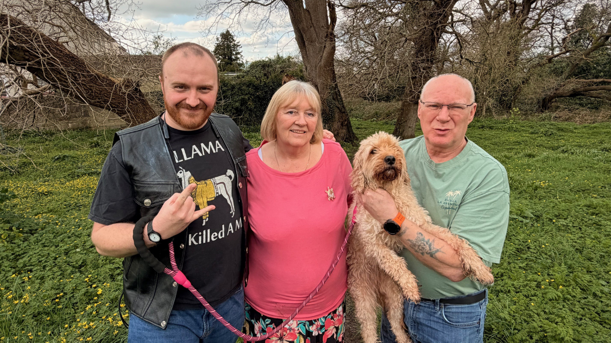 Shared Lives Carers Susan and Robert Smith with Spike, who they support.