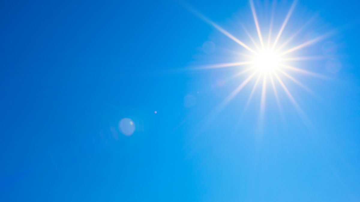 A bright sun in the blue sky
