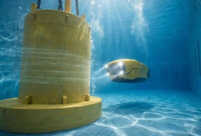 An underwater submersible in a very deep tank of water