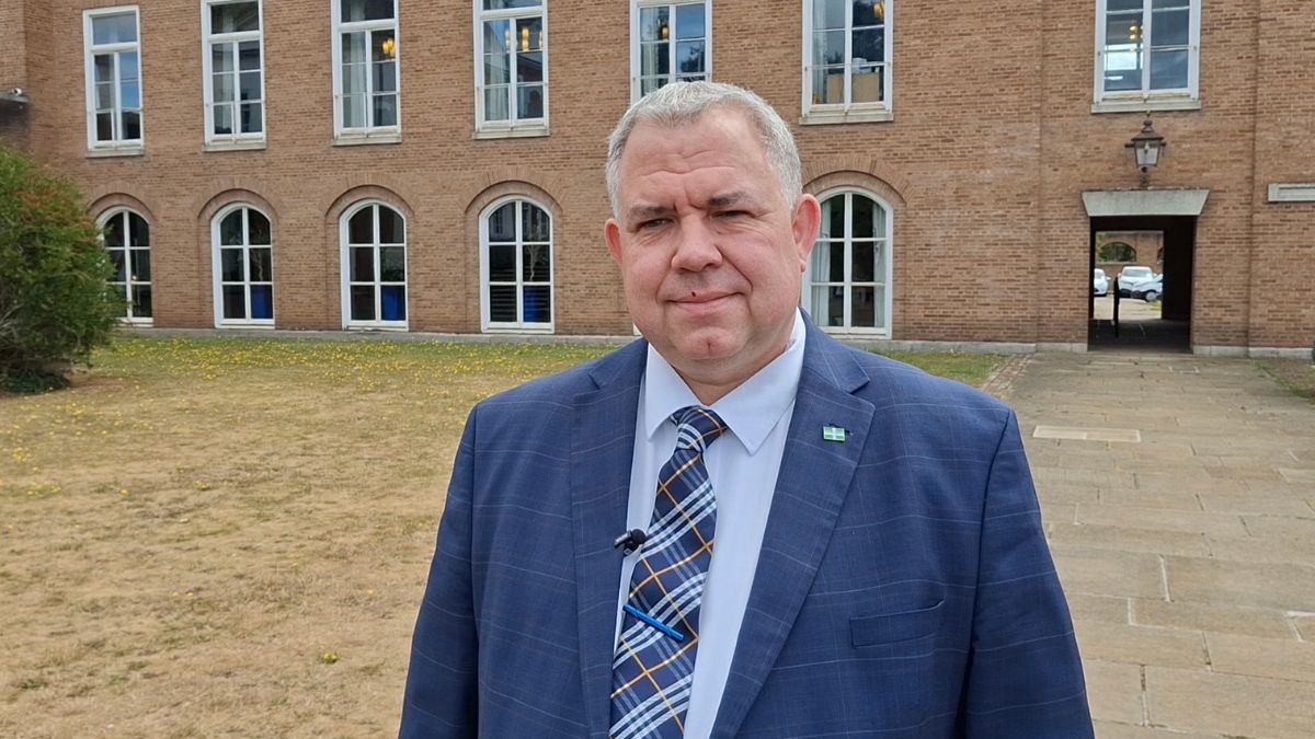 Councillor James Buczkowski, Cabinet Member for Finance outside County Hall, Exeter