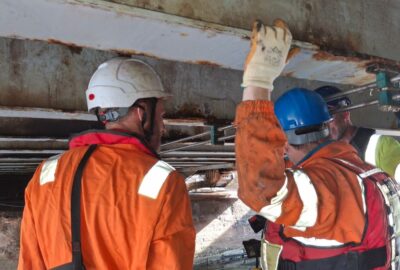 Engineers from the council's bridge team investigate under the bascule bridge, Bridge Road, Exeter
