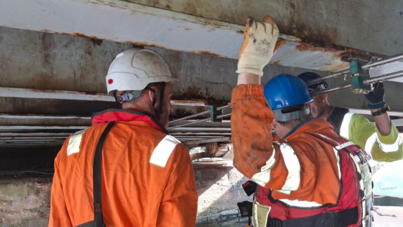 Engineers from the council's bridge team investigate under the bascule bridge, Bridge Road, Exeter