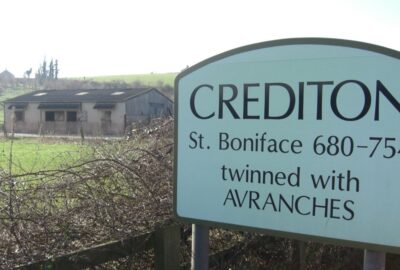 Sign for Devonshire town of Crediton, where proposed Boniface Trail cycling and walking route would start