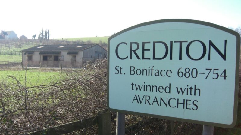 Sign for Devonshire town of Crediton, where proposed Boniface Trail cycling and walking route would start