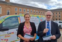 Councillor Cheryl Cottle-Hunkin and Councillor Stuart Rogers stood in front of Cllr Rogers' post office van at County Hall, ready to be interviewed.