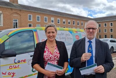 Councillor Cheryl Cottle-Hunkin and Councillor Stuart Rogers stood in front of Cllr Rogers' post office van at County Hall, ready to be interviewed.