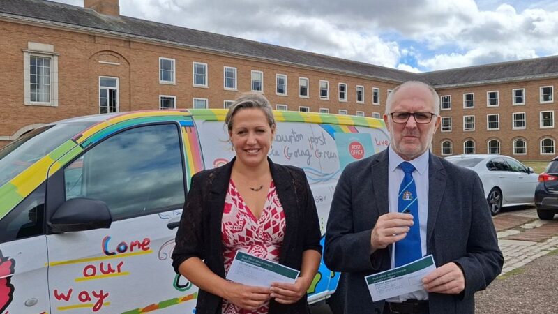 Councillor Cheryl Cottle-Hunkin and Councillor Stuart Rogers stood in front of Cllr Rogers' post office van at County Hall, ready to be interviewed.