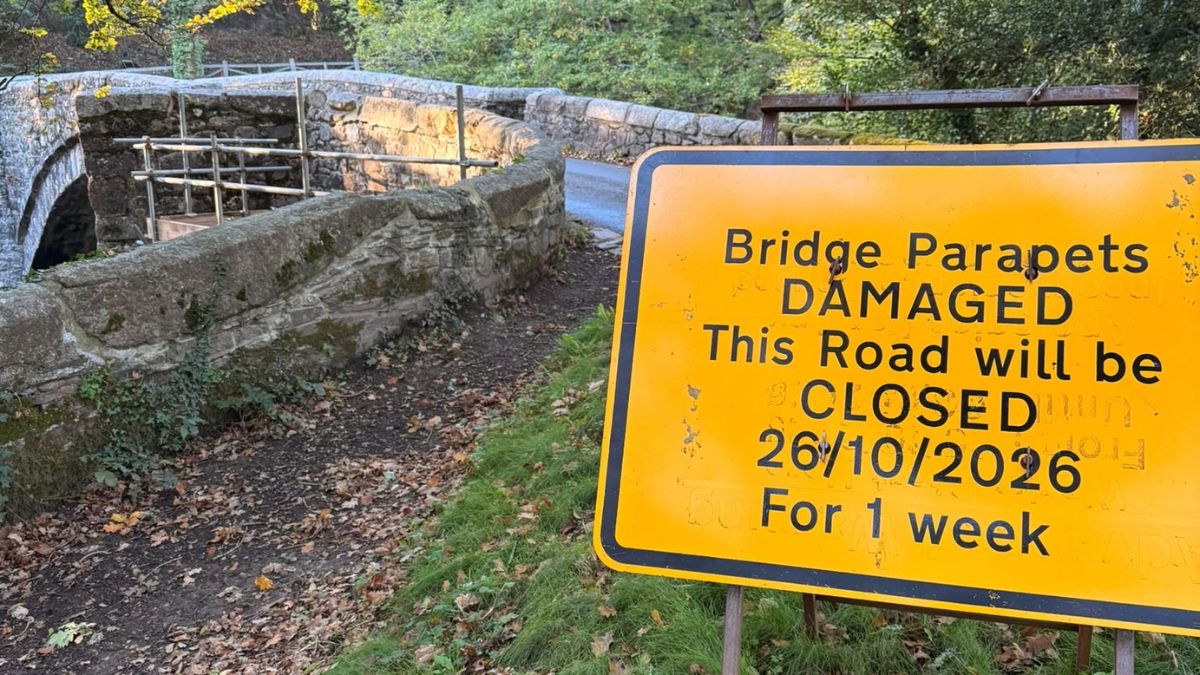 Sign at Holne Bridge stating when the bridge will be closed