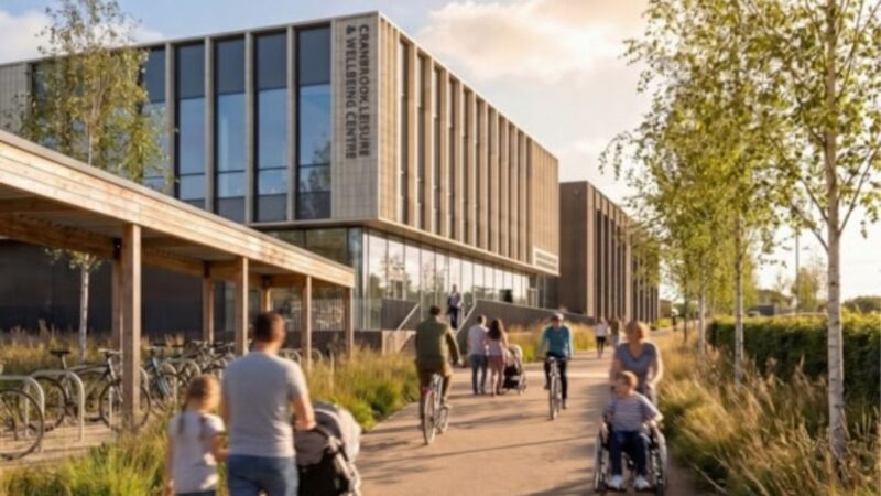 Artist’s impression of Cranbrook Leisure and Wellbeing Centre, with people walking and cycling outside.