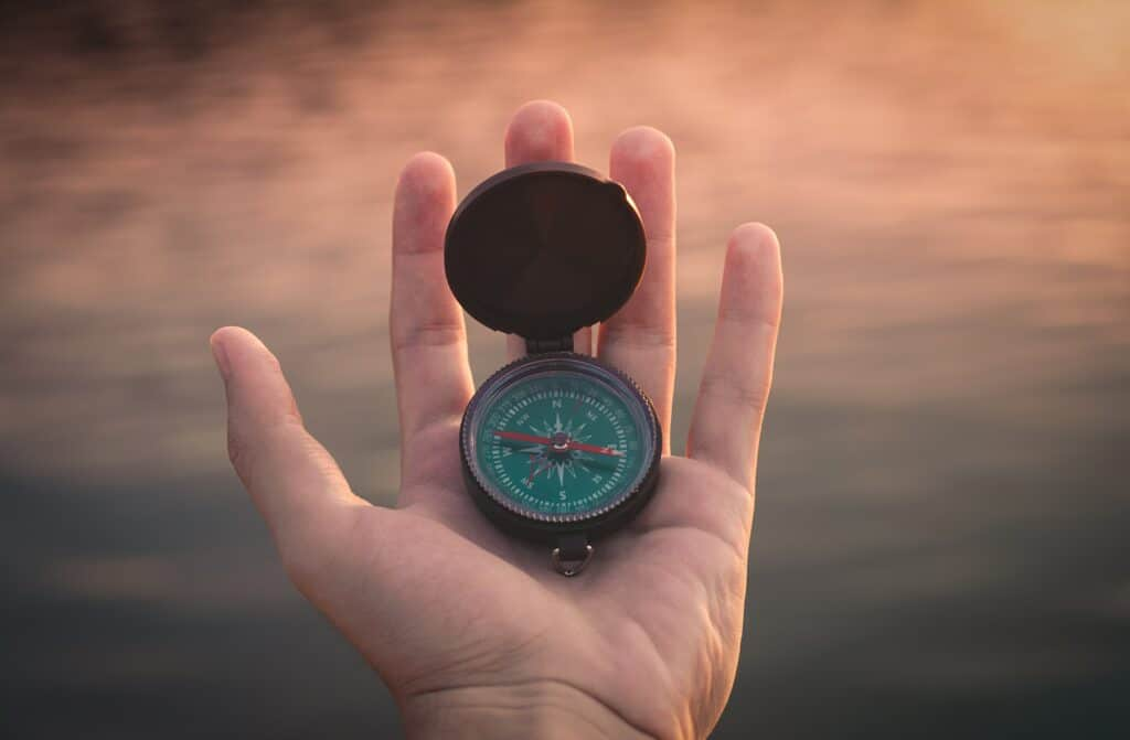 Photo of compass by Aron Visuals on Unsplash