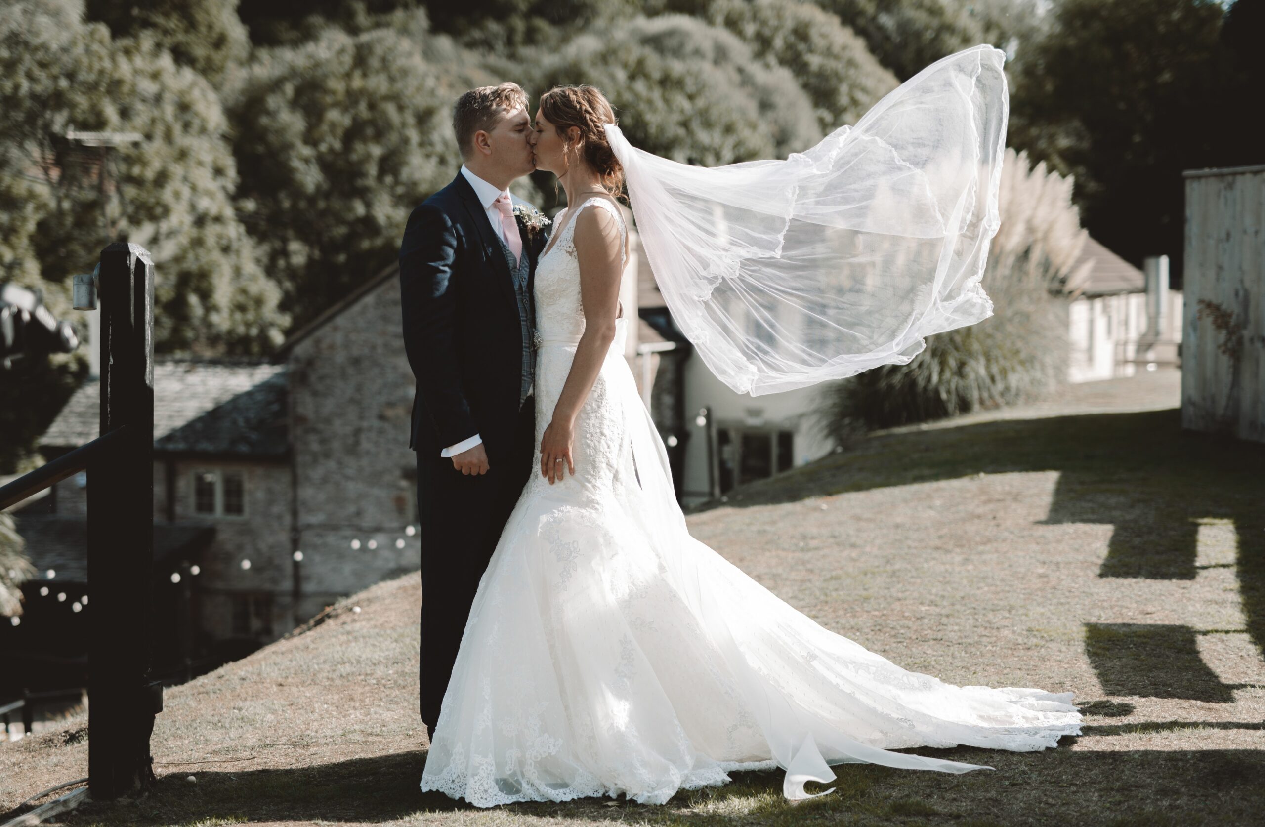 Bickleigh Mill Wedding venue pictured with a bride and groom