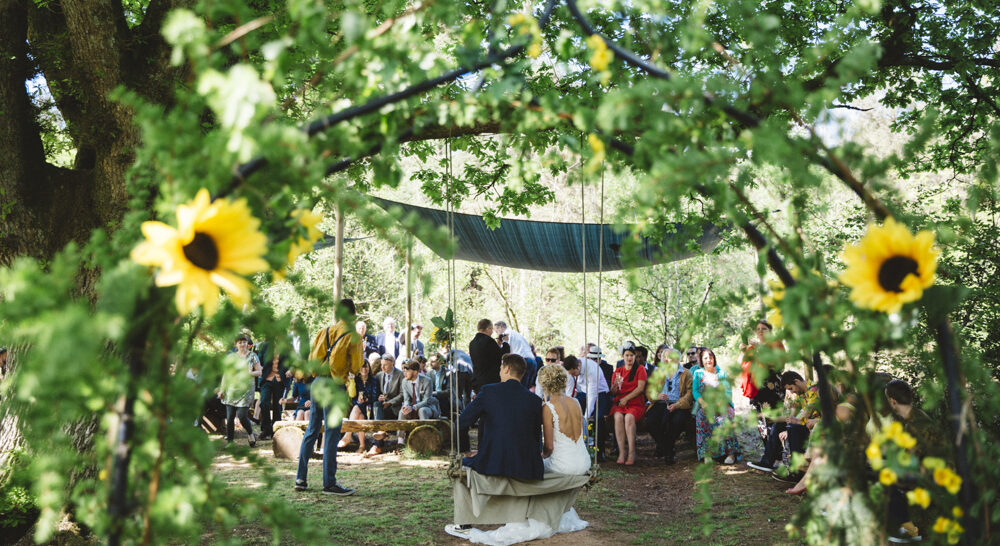 Guests outside at a wedding at Middle Coombe Farm