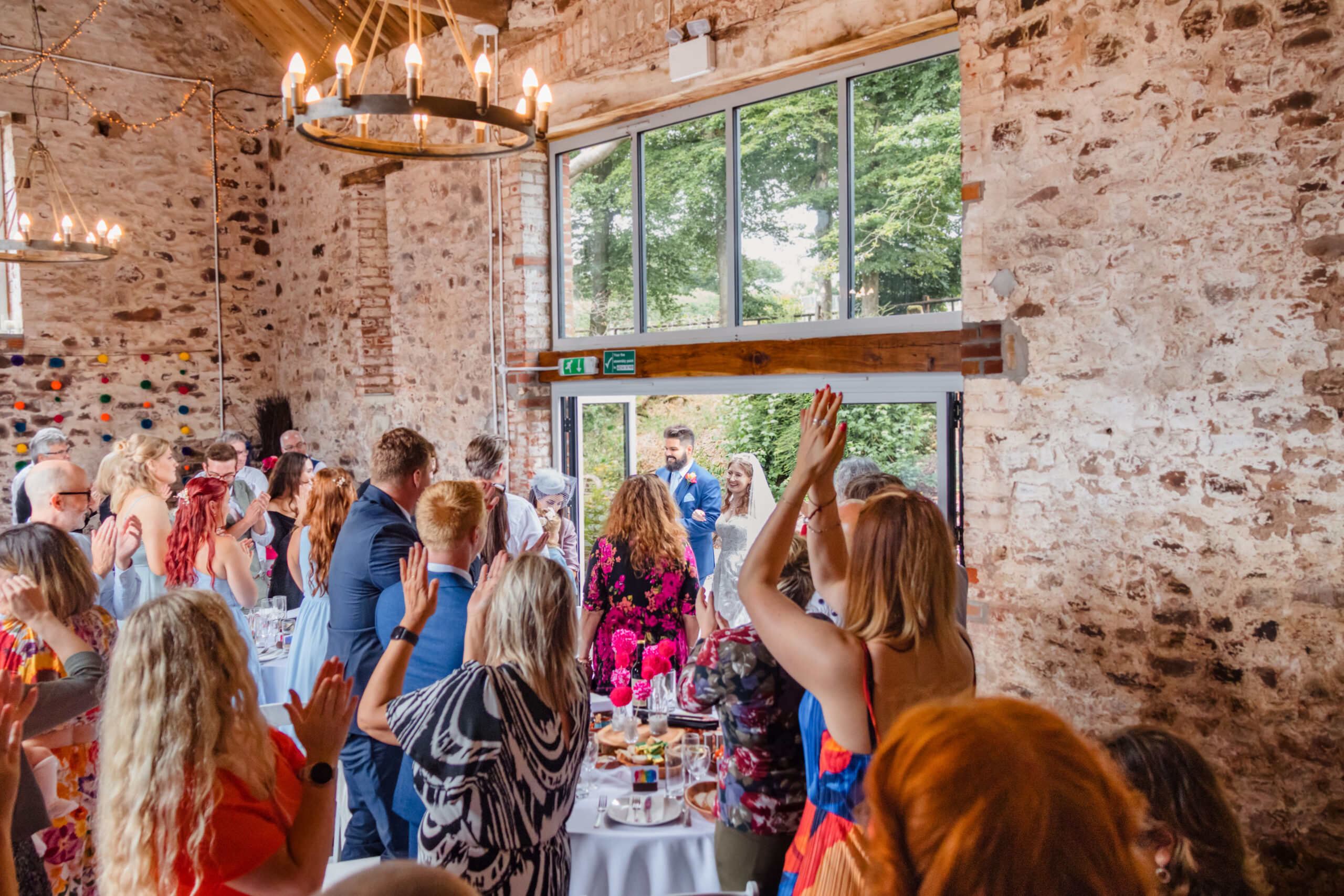 A bride and a groom at Hawke Barn wedding venue