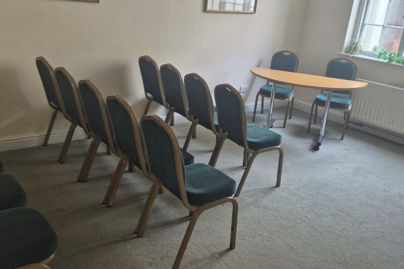 The Nash Room at Follaton House with chairs and table set out for a ceremony