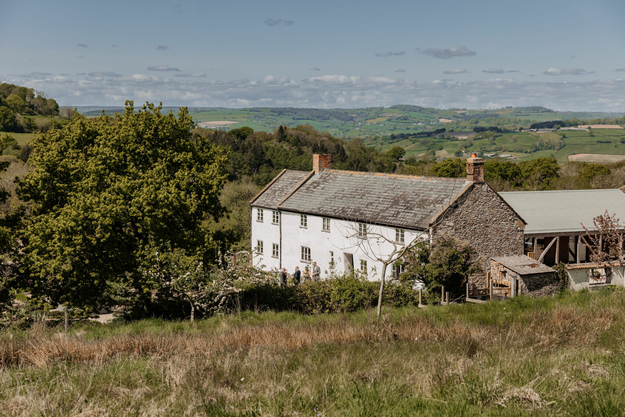 A white building set in open countryside