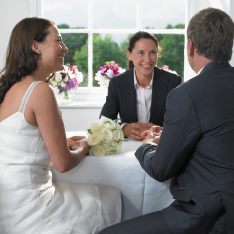 registrar signing register with couple