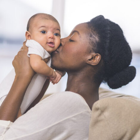 woman holding baby