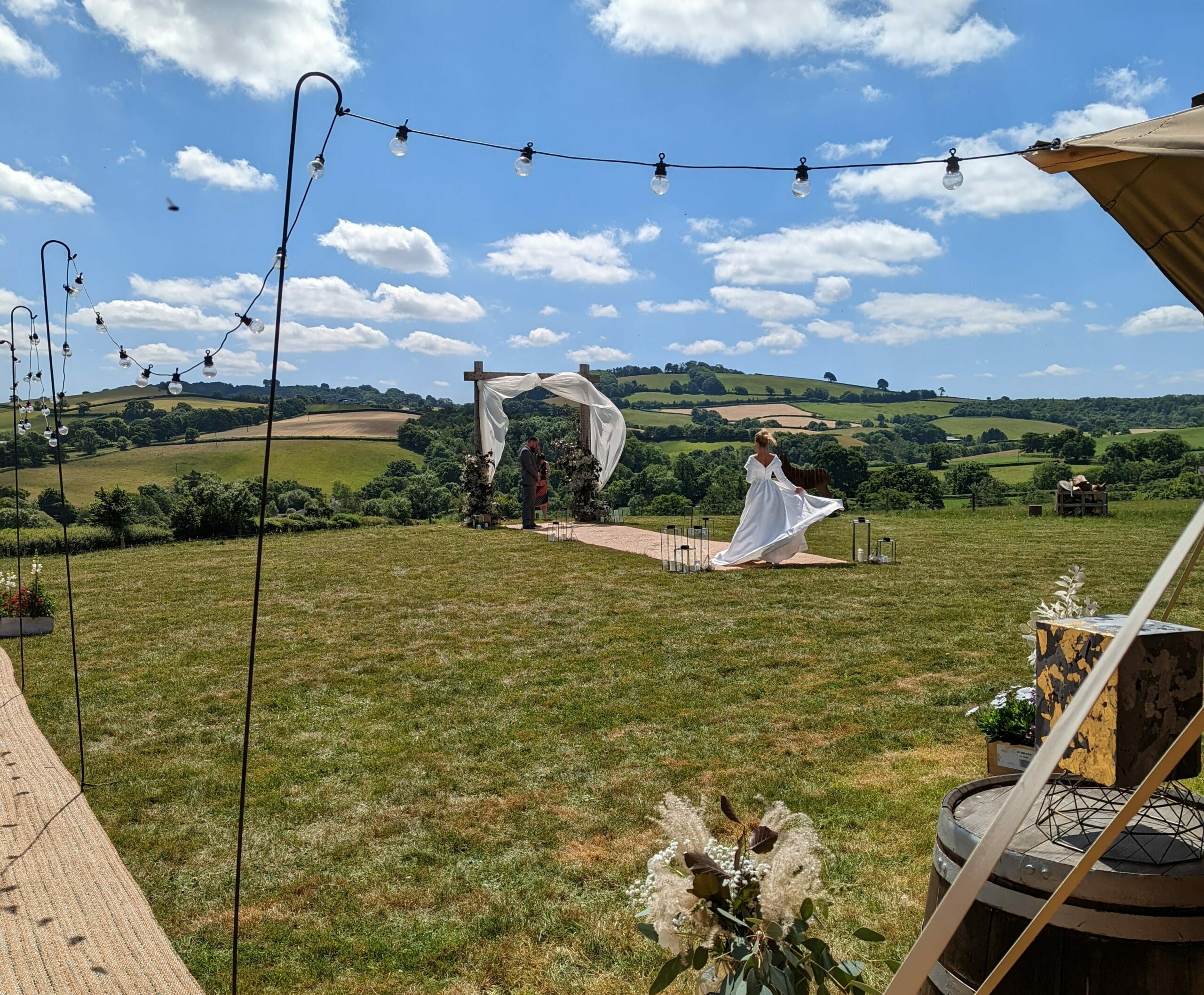 A wedding taking place outside at Deer Farm.
