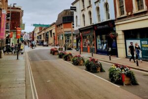 Photo of Queen Street temporary enhancement scheme, showing planters used to widen footway