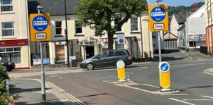 Image of the two bus gate signs at Taw Vale, Barnstaple