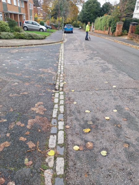 image shows road before resurfacing 
