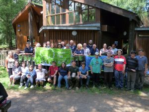 Stover rangers and volunteers photographed with the Green Flag Award banner