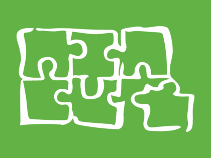Drawing of the outline of a jigsaw puzzle in white on a bright green background