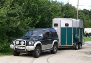 4 x 4v vehicle towing a horse box