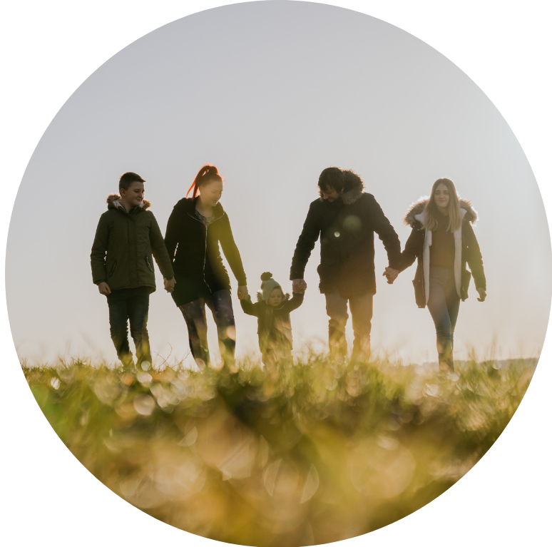 Group of people walking with a child.