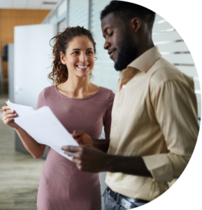 two social workers looking at a work document