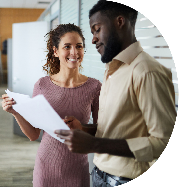 two social workers looking at a work document