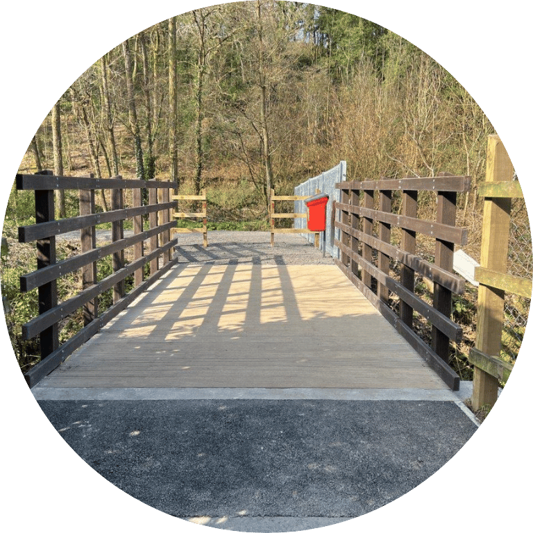 Image is cropped to a circle and shows Knowle Footbridge Replacement