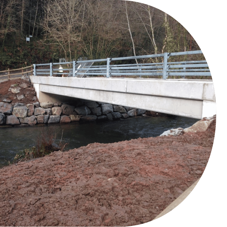 Image is cropped to a D shape and shows Collard Bridge